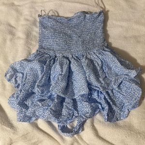 Blue Skirt with White Dots Design With a Bow in the Back in Size Medium!